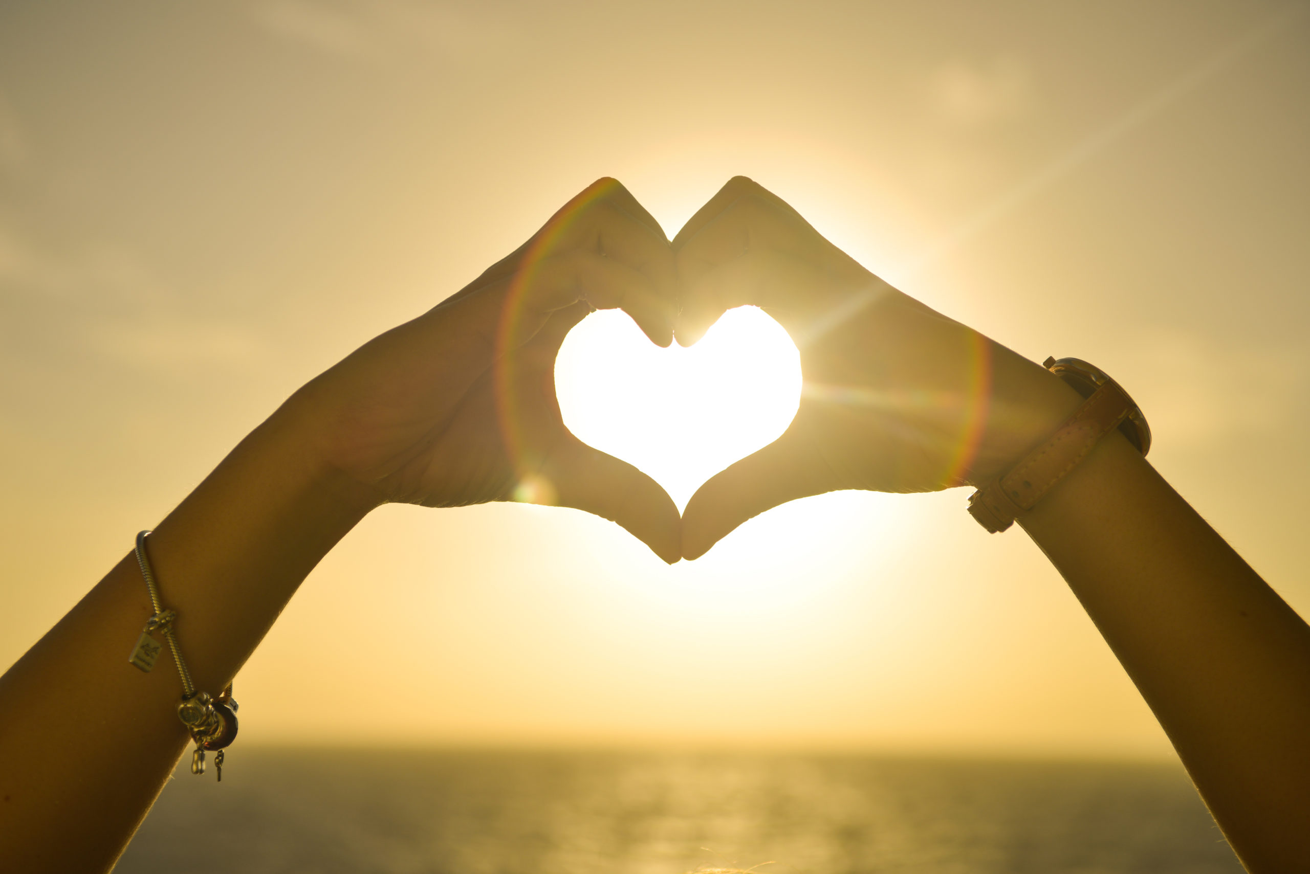 https://suehawkes.com/wp-content/uploads/2020/09/Canva-Two-People-Forming-Heart-Sign-to-Sun-scaled.jpg